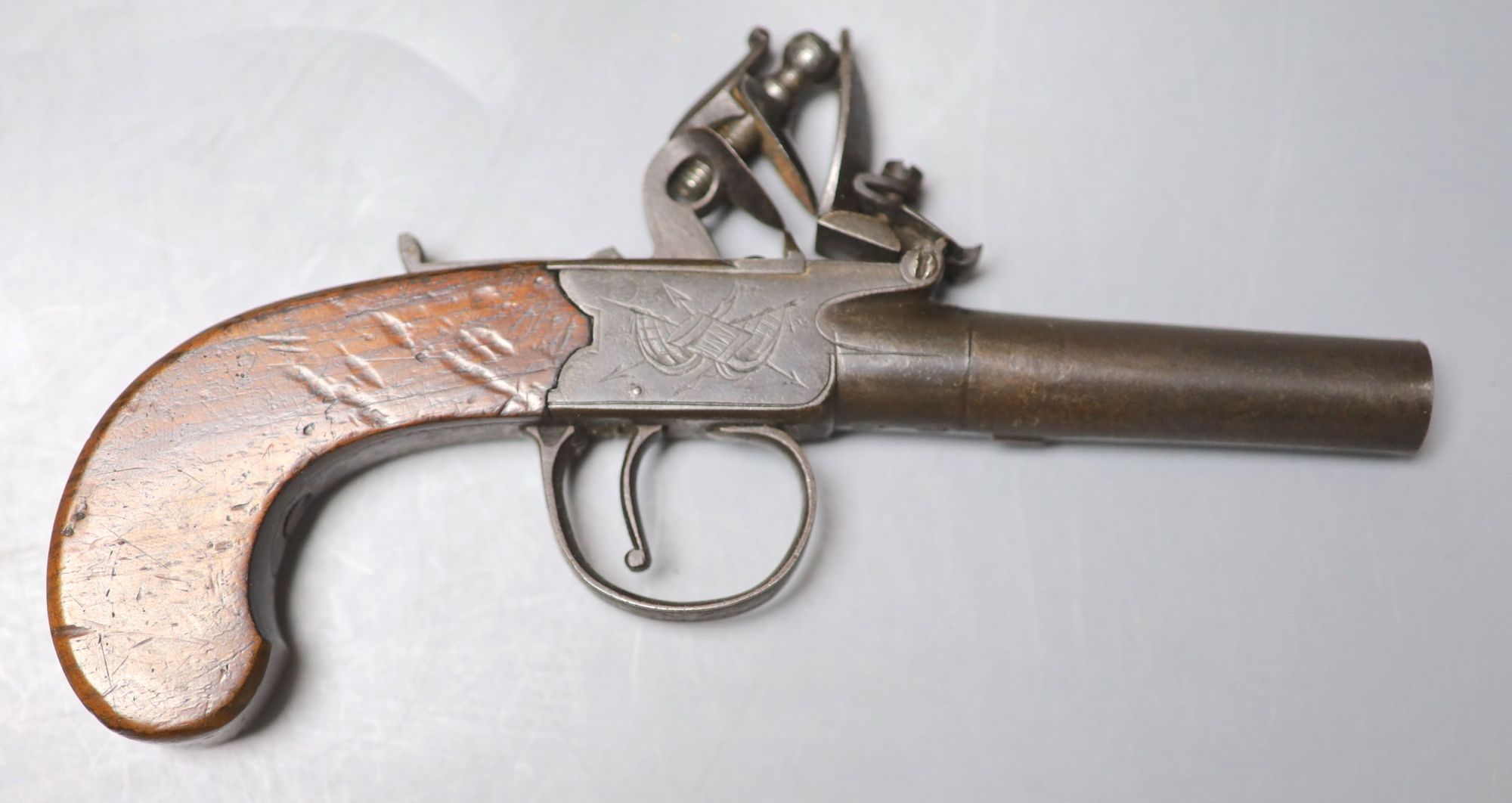 Two 19th century Dunderdale, Mabson & Labron steel flintlock pocket pistols, turn off barrels and walnut butts, in a later oak case